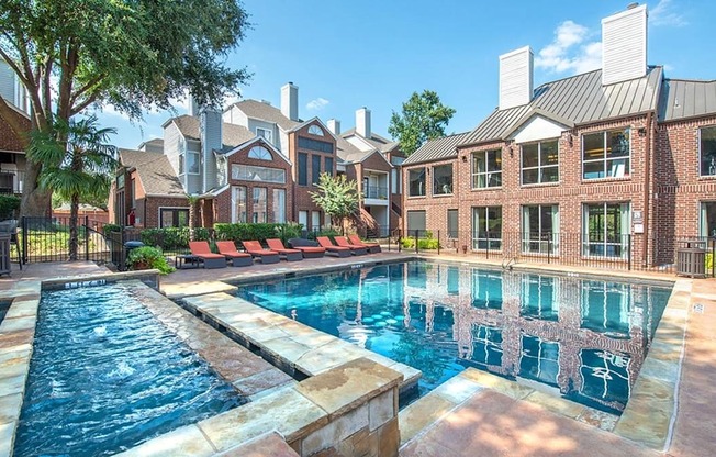 Lakewood on the Trail poolside view with lounge chairs Dallas, Texas Apartment with indoor hot tub