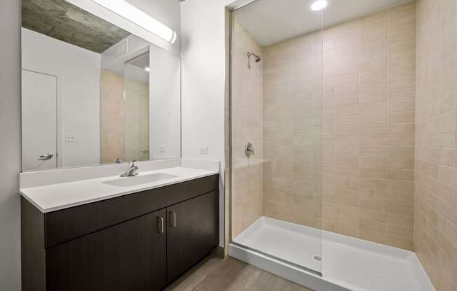a bathroom with a sink and a bathtub at Lakeview 3200 Apartments, Chicago, Illinois