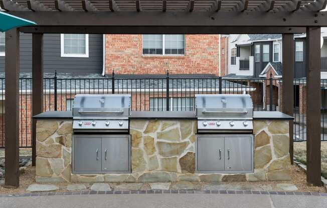 Apartment Frisco TX - McDermott Place - Two Stainless Steel Grills under Pergola with Countertop