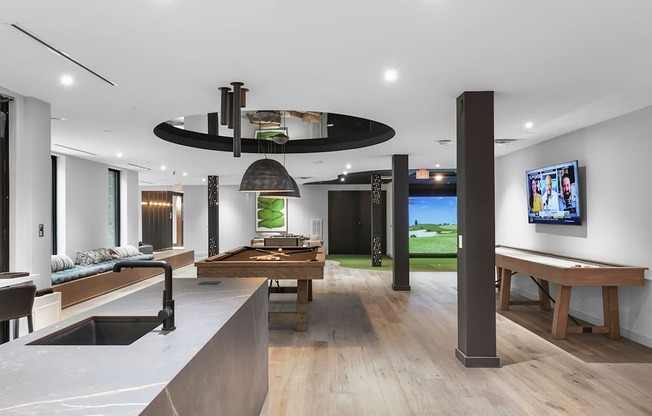 Social kitchen, pool table, virtual golf, and shuffleboard in gaming lounge