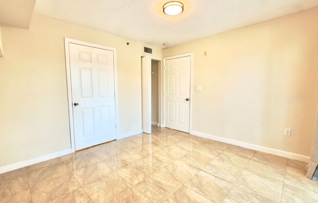 Beachside One Bedroom Condo with Parking and In Unit Laundry
