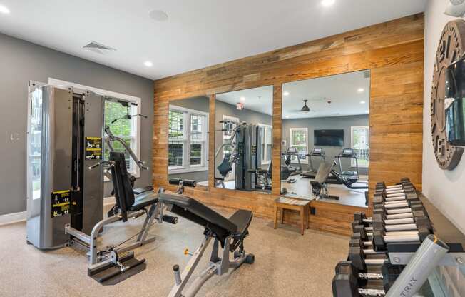 the gym has plenty of equipment including treadmills and weights at Barclay Chase Apartment Homes, Marlton