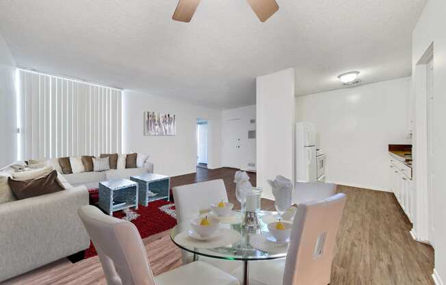 Dining area ; Ceiling Fan ; Wood Inspired Flooring