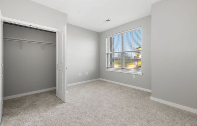 an empty bedroom with a closet and a large window at Madison Prickett Preserve, Yardley Pennsylvania