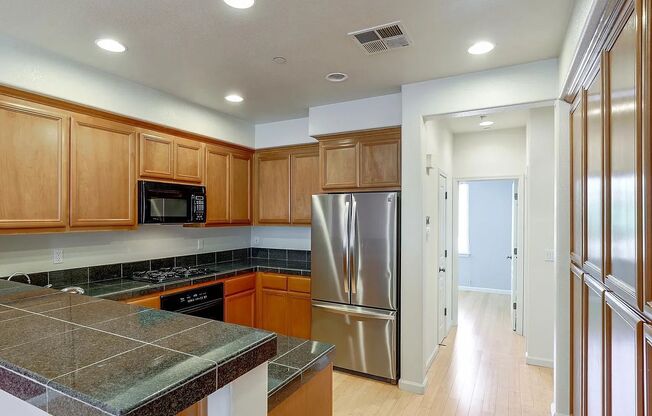UPGRADED HOME IN HIGHLY CENTRAL SETTING. RARE 3-BED/3-BATH FLOOR PLAN!