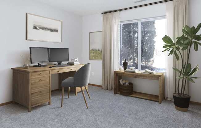 a home office with a desk and two computer monitors