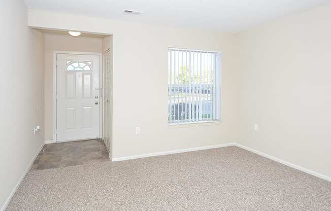 Apartment Home Entry Way with Closet and Tile Style Flooring