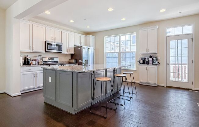 Stunning 4 bedroom townhome with garage