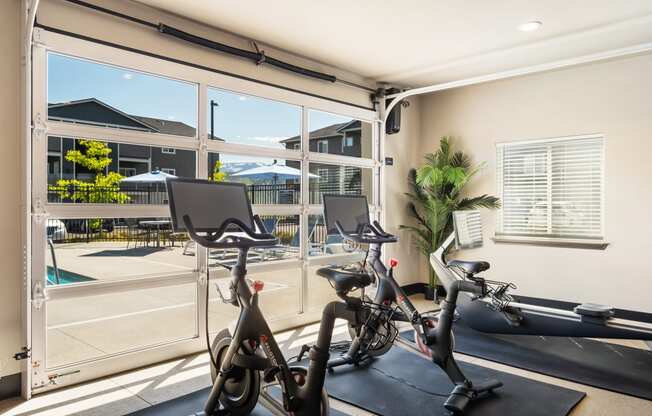 the gym at the enclave at woodbridge apartments in sugar land, tx  at Altitude, East Wenatchee