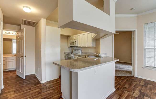 Large kitchens at Turnberry Isle Apartments in Dallas, TX.