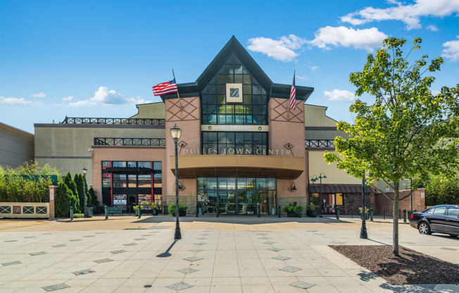 a building with two flags in front of it