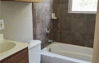 Remodeled 1 story home in Hurst with original plank wood flooring