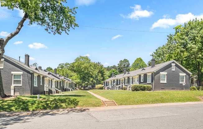 A row of houses with green trees at Balfour Marietta Apartments, Marietta, Georgia