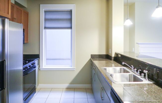 Lakeside 2BR Condo with Modern Finishes & Prime Location!