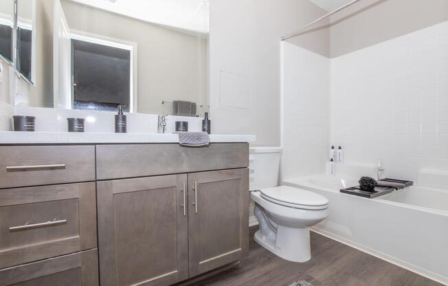 a kitchen with a sink and a mirror
