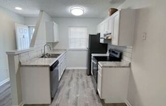 Sleek Renovations! $1335/mo.! 2 Bedroom, 2 Full Bath, Single Story Garner Townhome!