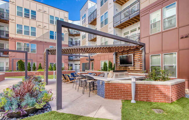 Outdoor Grill With Seating Area at Centric LoHi by Windsor, Denver