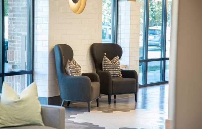 a couple of chairs in front of a window at 511 Meeting, South Carolina