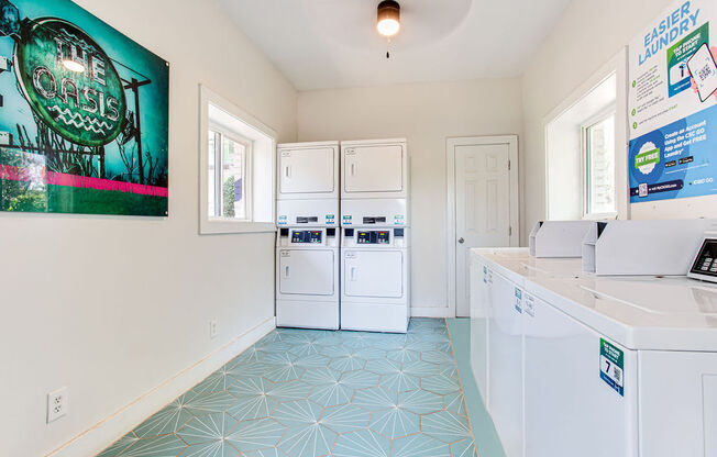 a laundry room with a washer and dryer  at The Oasis on Cascade, Atlanta, 30310