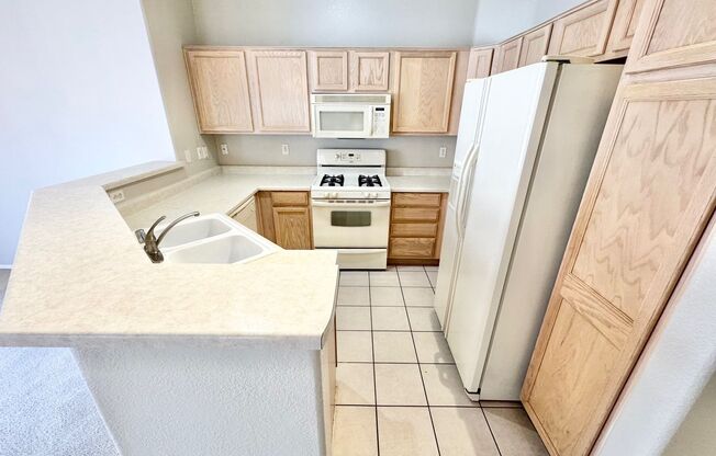 STUNNING 3 BEDROOM, 2 BATHROOM SINGLE-STORY HOME WITH A 2-CAR GARAGE LOCATED IN A GATED COMMUNITY!
