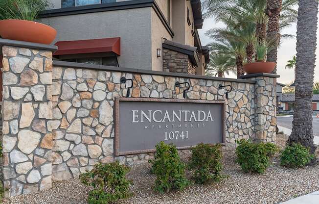 a sign in front of a building