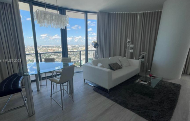 Remarks:	Enjoy stunning Skyline and Bay views from the wraparound balcony of this furnished 2-bedroom, 2-bathroom corner unit for rent at Brickell Heights.