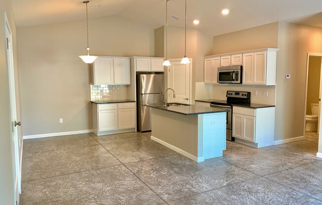 Recent construction --  3 bed/ 2 bath Duplex & 2 car garage
