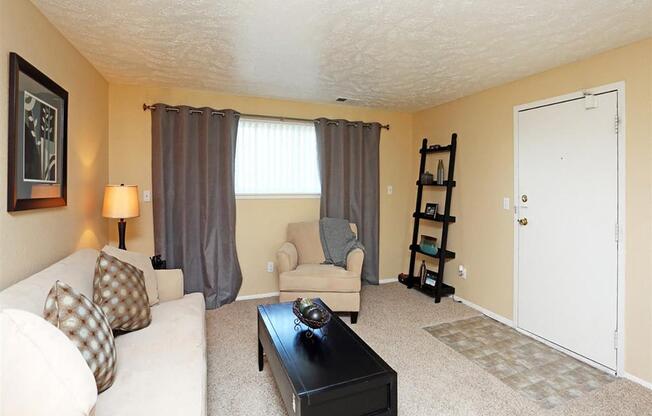 a living room with a couch and a coffee table