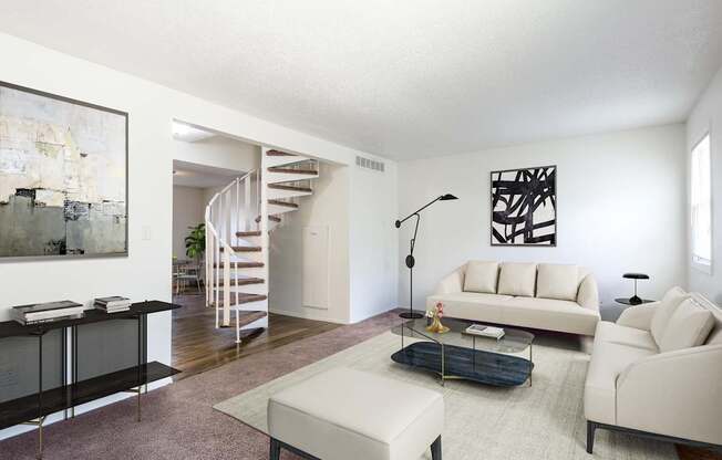 A living room with a white couch, a black coffee table, and a spiral staircase at Spring Creek Townhomes Apartments, Springfield 62702