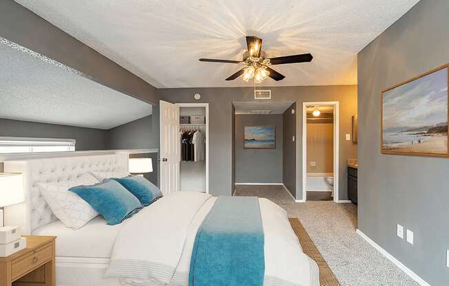 Large primary bedroom at summit on the lake apartments