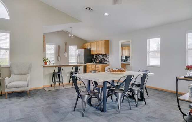 Dining space and community kitchen in the clubhouse at Skyline View apartments