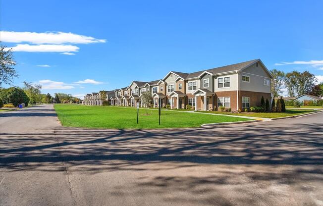 Newly-built section of Muskego School Apartments with large green lawns