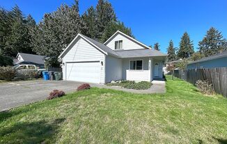 Additional sunroom compliments this lovely 3-bedroom home!