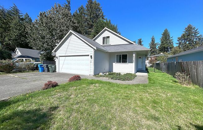 Additional sunroom compliments this lovely 3-bedroom home!