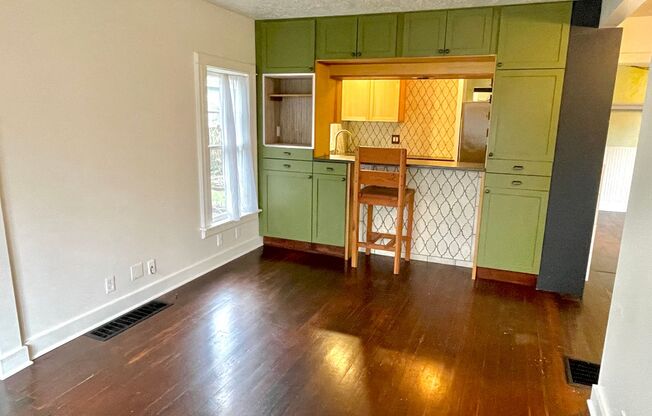 North Tabor Charmer with Sprawling Backyard, Detached Garage, Hardwoods, Lots of Upgrades