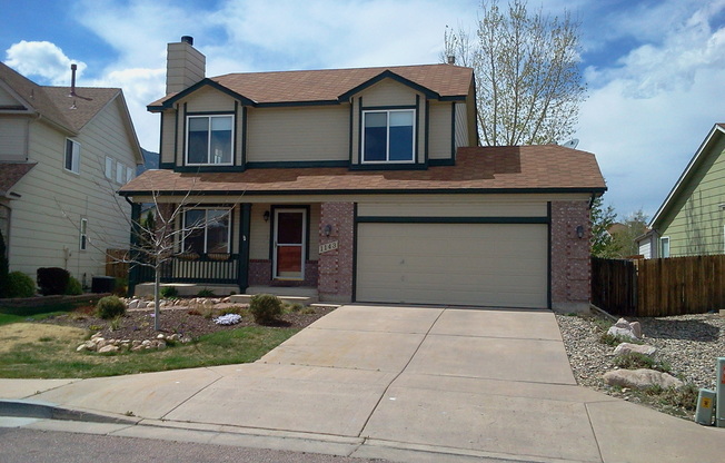 Exceptional 4-Bedroom Home with Cozy Fireplace and Central Air: Near Fort Carson!!