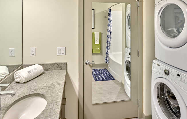 Bathroom with In-Home Washer and Dryer