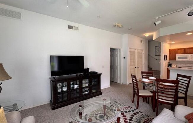 Fully Furnished 4 Bedroom 2 Bathroom Townhome in gated community.