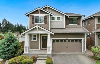 Fabulous 4 bedroom two story home situated on a corner lot in Federal Way!!