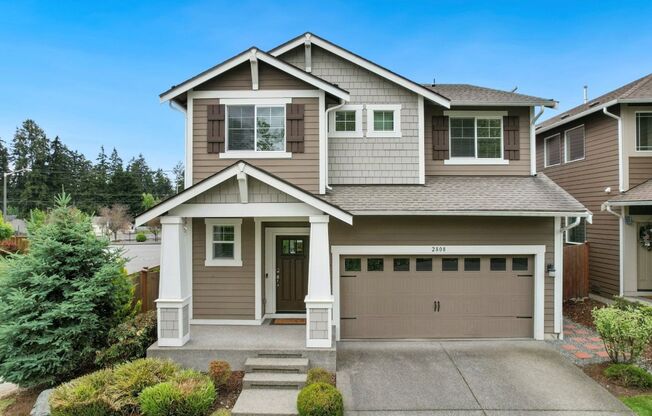 Fabulous 4 bedroom two story home situated on a corner lot in Federal Way!!