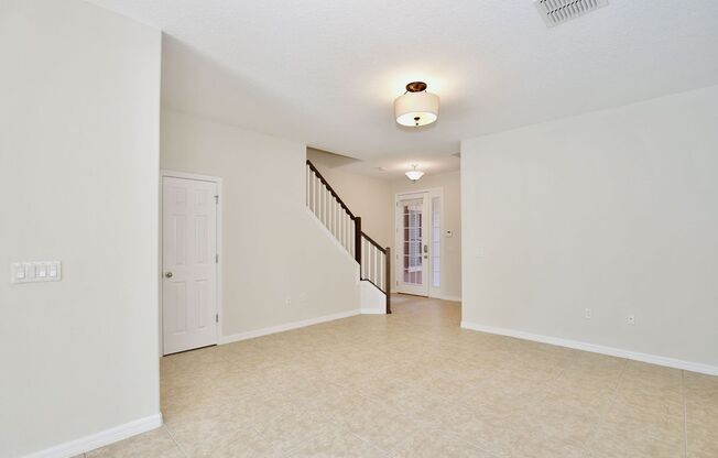 Stylish 3/2.5 Townhome with Open Floor Plan, Garage & Patio in Gated Community