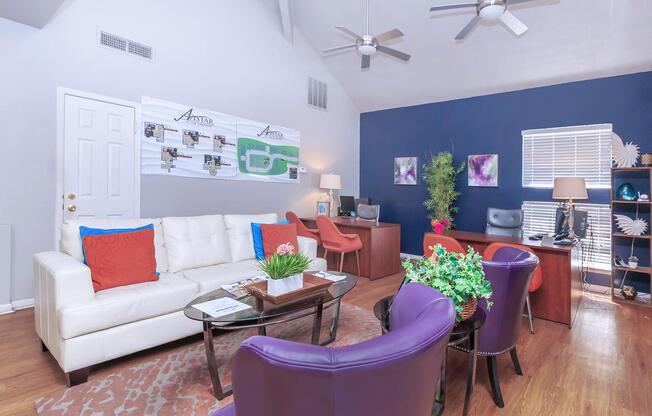 a living room filled with furniture and a table