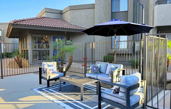 Pool Seating Area and Gym Entrance at Olive East Apartment in Gilbert Arizona 2025.png