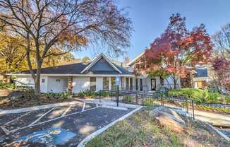 Parking in front of leasing center at Rosemont Vinings Ridge Apartments, 3200 Post Woods Dr. NW, Atlanta