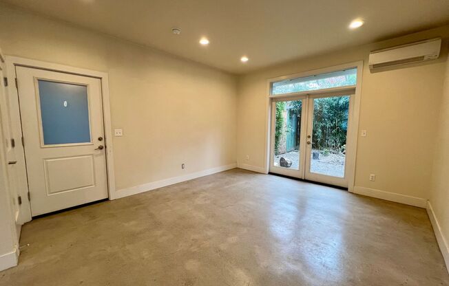 Spacious Two-Story 1 Bedroom, 1 Bathroom Unit with Private Patio, Air Conditioning, and Washer/Dryer Included