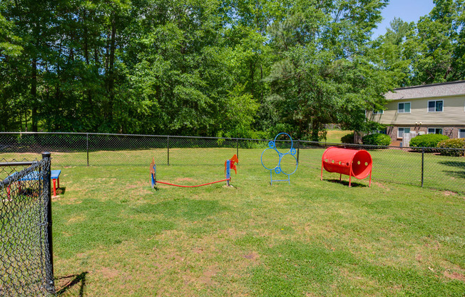 Dog Park With Agility Equipment at Lakecrest Apartments, PRG Real Estate Management, Greenville, SC