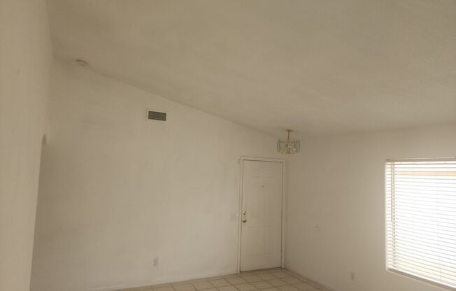 Single story with tile flooring and gas fireplace.