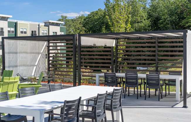 a patio with a table and chairs at Edgebrook Residences, New Hampshire