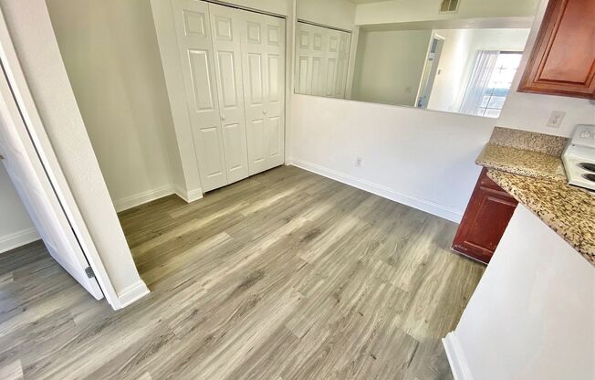 CONDOMINIUM IN A GATED COMMUNITY WITH 2 BEDROOMS AND 2 FULL BATHS