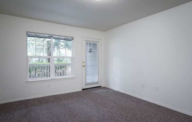 Village at Main Street | 2x2 Bedroom Two with Wall to Wall Carpeting and Light Filled Window
